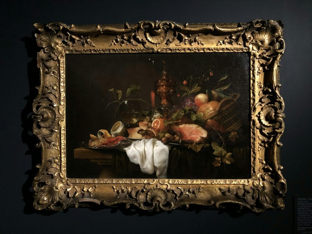 Antiek schilderij in sierlijke lijst als voorbeeld van kunst die onder een kostbaarhedenverzekering kan worden verzekerd.
